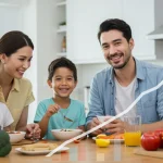 Smiling family enjoying a healthy meal, representing increased SNAP benefits and food security.